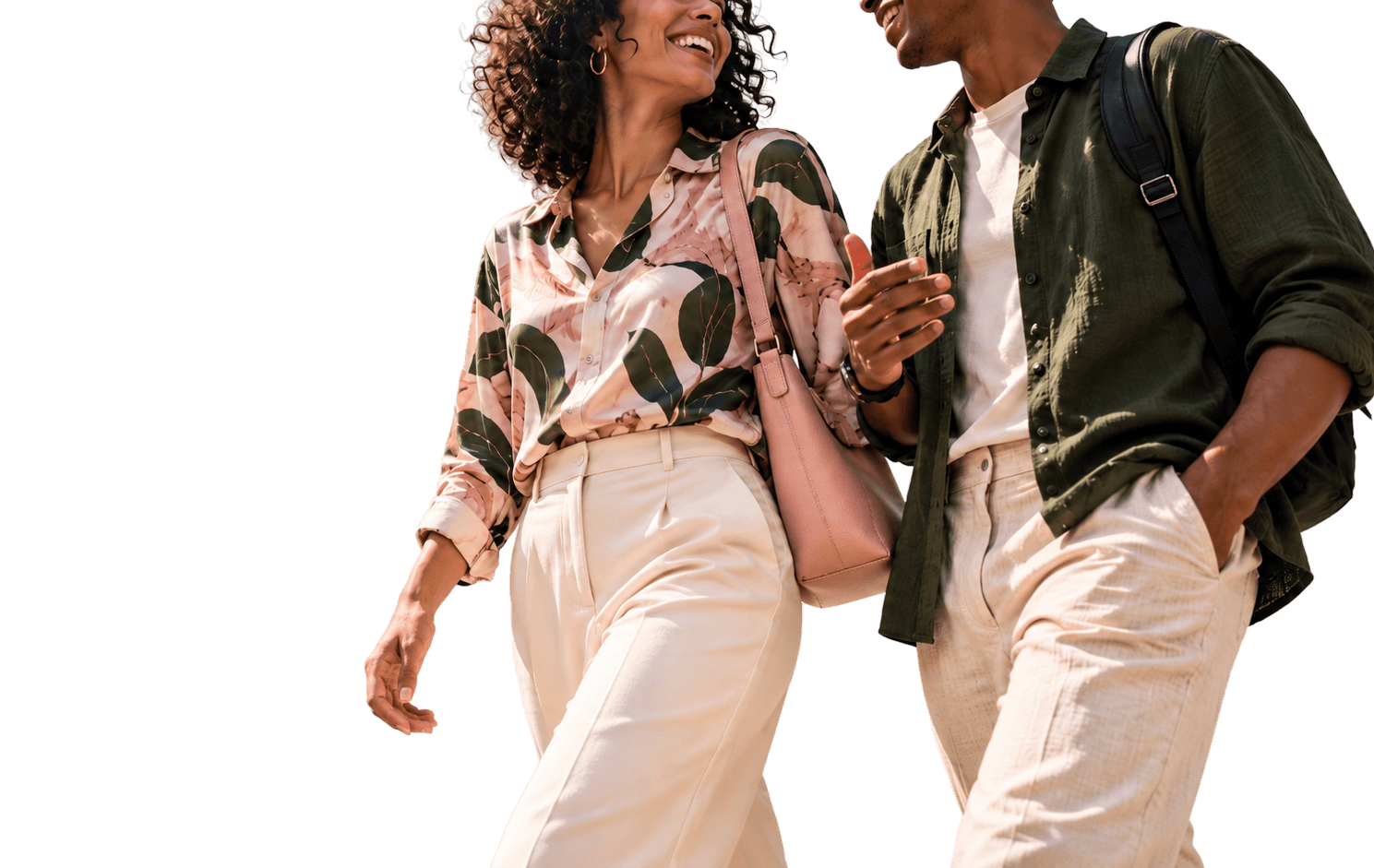 A smiling couple walking and talking together.